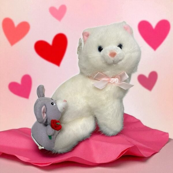 Vintage Russ Caress Soft Pet White Cat with Mouse holding a Red Flower. Probably from the 90's. Cute one! Still has its tag on an ear.