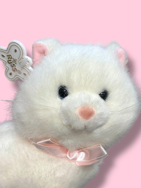 Vintage Russ Caress Soft Pet White Cat with Mouse holding a Red Flower. Probably from the 90's. Cute one! Still has its tag on an ear.